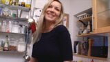 Outstanding German MILF with huge boobs dildoing her shaved muff in the kitchen snapshot 4