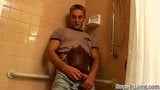 Cute jock pisses and wanks in shower snapshot 3