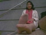 Asian woman showing her feet snapshot 4