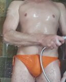 Another quick shower in sexy orange bikini snapshot 11