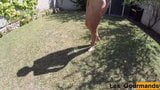 MILF tans naked outside and pissing in a tall glass snapshot 5