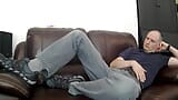 Kudoslong on the sofa strips naked his hairy cock becoming erect as he masturbates thrusting and showing his anus snapshot 1