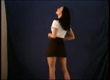 Ravenhaired babe stripdancing snapshot 3