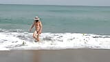 Bikini in the surf snapshot 3