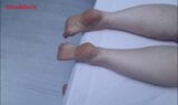 Anna shows the soles of her feet on the bed. Will you like it? snapshot 1