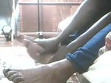 Rubbing lotion on my feet snapshot 3