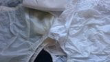 Diaper and Lots of White Plastic Pants. snapshot 1