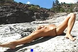 Amazing looking German blonde rubbing her shaved twat outdoors snapshot 14