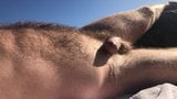 Goteando precum en la playa snapshot 9