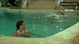 S. Grandi in white panties swimming with a guy in a 1987 movie snapshot 8