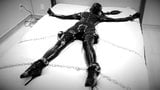 Breath restriction while chained to the bed in latex snapshot 5