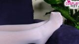 Sexy nurse in white stockings teases with her feet and toes snapshot 12