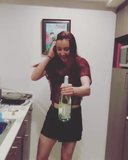 British Cassie opening a champagne bottle snapshot 5