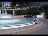 Marjorie is getting wet in a public fountain - outdoor snapshot 2