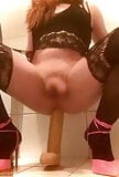 Sissy swings her clitty while riding huge dildo snapshot 3