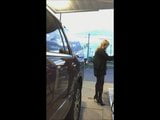 Gassing up in mini-dress snapshot 1