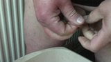 Piss with table tennis ball and 8 marbles in foreskin snapshot 3
