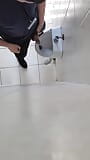 Risky wank in public urinal snapshot 1