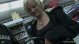 Kinky blond slut having fun with a cock in the store snapshot 1