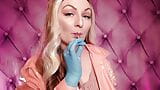 ASMR: blue nitrile gloves and candy sucking, wearing pink PVC coat, girl in braces  (Arya Grander) snapshot 9