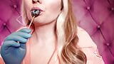 ASMR: blue nitrile gloves and candy sucking, wearing pink PVC coat, girl in braces  (Arya Grander) snapshot 11