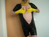 in my tight rubber short suit showing my fat man tits snapshot 6