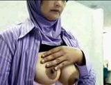 Indonesian house wife yoli with hijab playing boobs snapshot 2