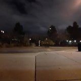 Streaking a street at night under a full moon snapshot 3