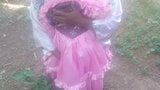 A man in a pink dress snapshot 1