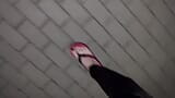 crossdresser in sexy flip-flops and latex leggings snapshot 2