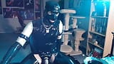 Rubberboy pissing an sounding in latex snapshot 14