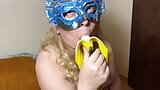 Ellie does a great striptease with a banana snapshot 11