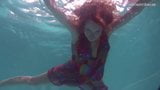 Redhead baby Nikita Vodorezova gets naked fast underwater snapshot 5