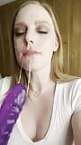 Blonde slut RoseThorneQOS deepthroats huge purple dildo snapshot 2