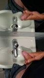 Felixproducer is wanking in a public toilet and cums all over the sink and the mirror snapshot 11