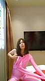 Amateur crossdresses wearing pink and leopard morphsuit masturbate snapshot 3