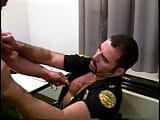 Manly cop fucks a horny gay stud in his office snapshot 7