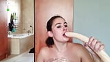 Dirty slut accumulates spit while deepthroating on a dildo snapshot 17