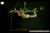 Amateur Asian teen tied up and hung on a tube snapshot 14