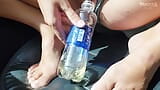 Peeing in a bottle on a passenger seat snapshot 7