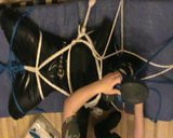 Boot to face - restrained rubberslave in the hogsack snapshot 12