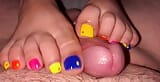 Tickling teasing colourful neon toes rubbing on a big head snapshot 6