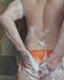 Another quick shower in sexy orange bikini snapshot 8