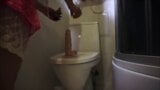She bounces on a dildo in the bathroom while i film snapshot 1