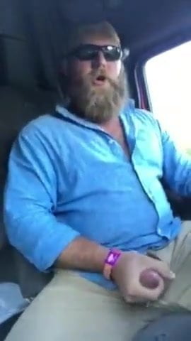 Bearded Trucker Jacks while Driving