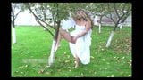 Girl in white dress peeing snapshot 9