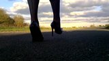 Walking in black patent hells fishnets and black tight skirt snapshot 3