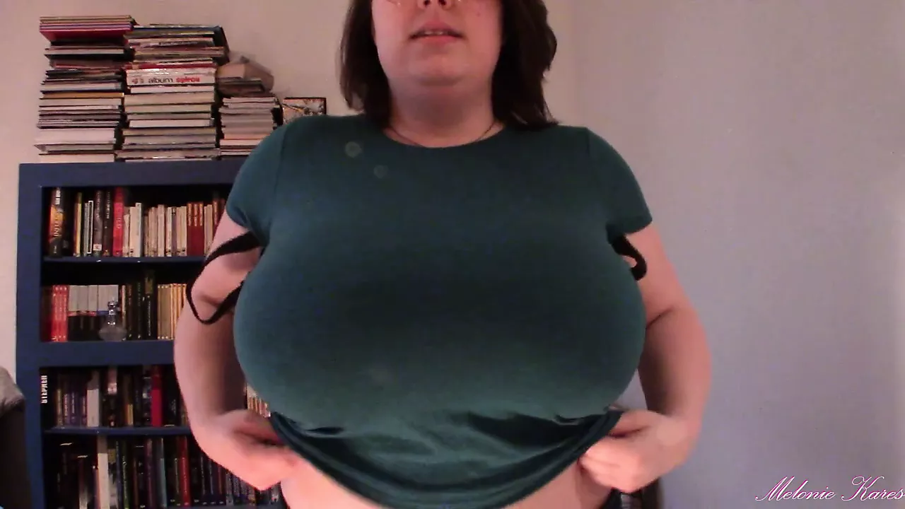 Huge boobs, tit drop, blue shirt