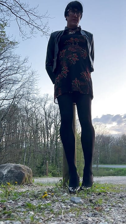 Sexy crossdresser walking outdoor