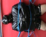 Straitjacketed slave is restrained to the Frame snapshot 2